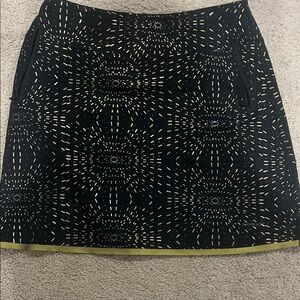 Cutter & Buck Black and Gold Patterned Mini Skirt. Annika cb drytec your 50+